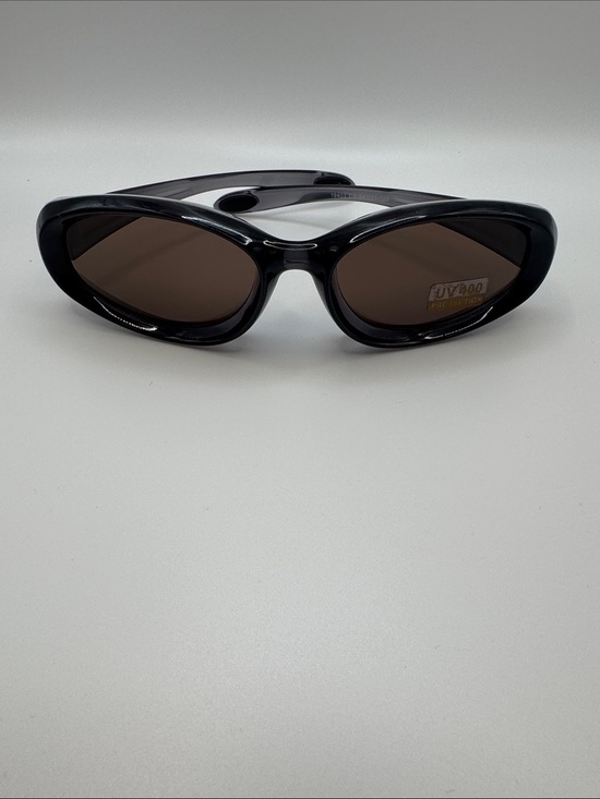 The Unbranded Brand Accessories - Women's Black Oval Sunglasses with Brown Lenses - UV400 Protection